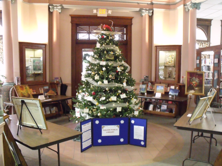 [photo of the tree and art show]