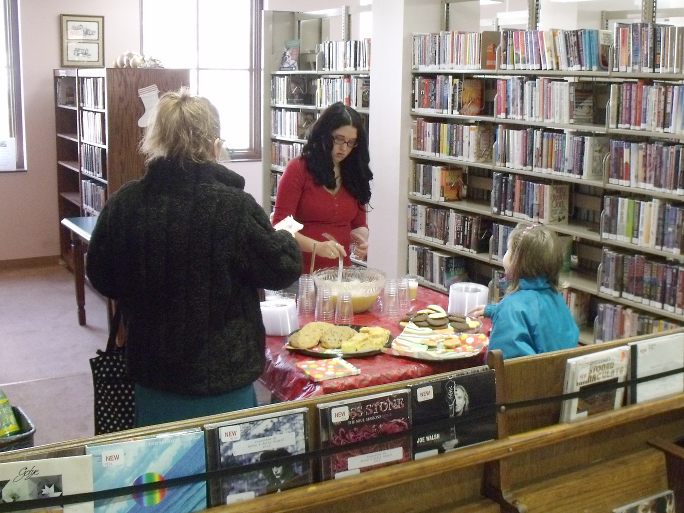 [photo of the refreshments table during a rare slow moment]