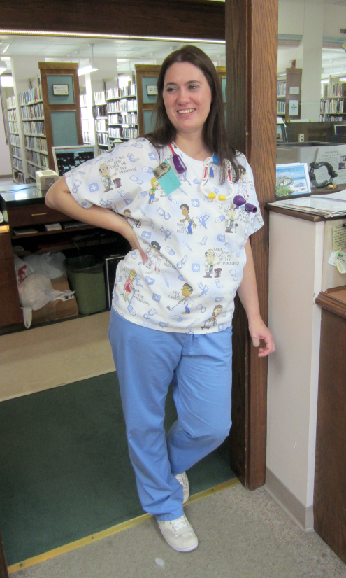 [photo of library staff member in nurse costume]